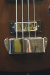 1972 Gibson EB-3 bass. Body detail - bridge cover, and the bridge humbucking pickup