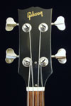 1972 Gibson EB-3 bass. Body detail - headstock with Gibson logo and crown inlays.