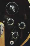 1976 Gibson L9-S Ripperbass. Body detail - volume and tone, and midrange speed knobs, input jack