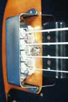 1976 Gibson L9-S Ripperbass. Body detail - note the plastic spacers beneath the bridge cover