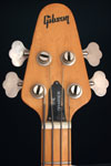 1977 Gibson Grabber bass. Body detail - headstock with Gibson logo.