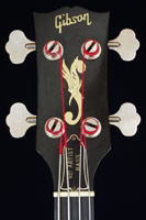 1978 Gibson RD Artist bass. Body detail - headstock with mother-of-pearl flying f-hole inlay