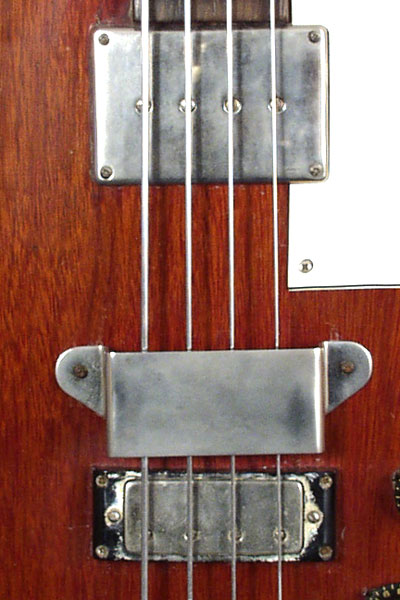 1962 Epiphone Newport Deluxe bass. Body detail - bakelite cover over humbucker pickup