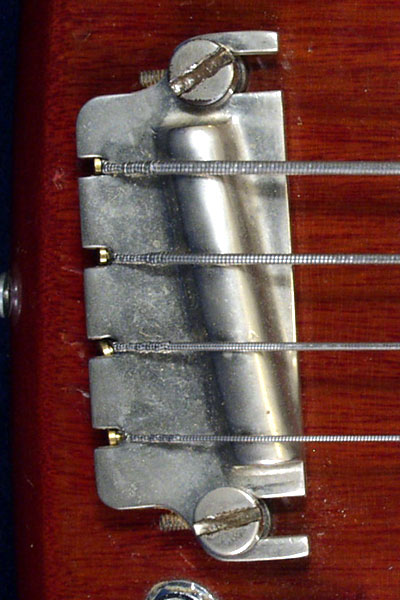1962 Epiphone Newport Deluxe bass. Body detail - nickel bar bridge