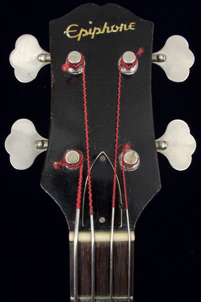 1962 Epiphone Newport Deluxe bass. Solid headstock with above-center crown inlay, and inlaid Gibson logo