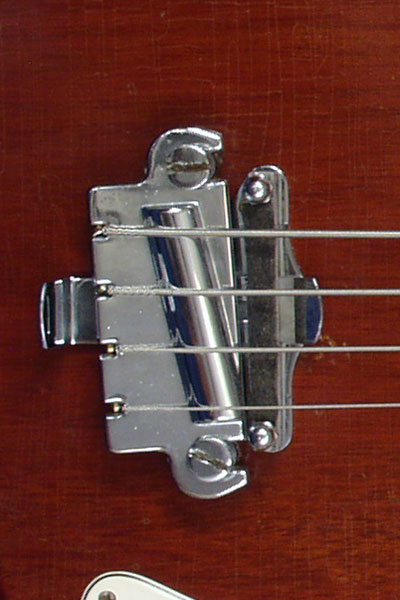 1965 Epiphone Newport bass. Body detail - chrome bar bridge