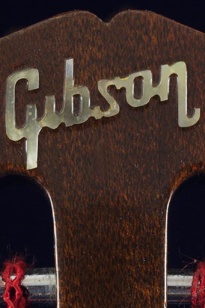 1971 Gibson EB-3. Headstock detail - the Gibson logo is a cutout piece of pearl, glued to the headstock