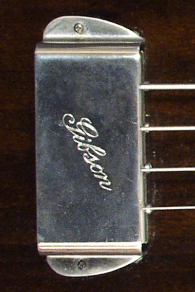 1971 Gibson SB400. Bridge cover, embossed with the word "Gibson"