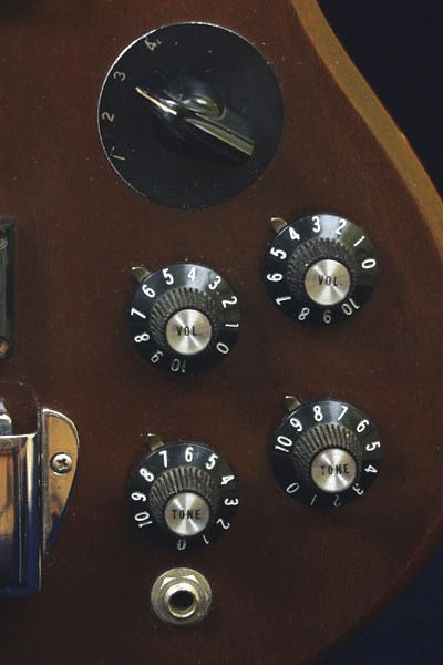 1972 Gibson EB3. Body detail - witch hat volume and tone knobs, output jack and chicken-head selector switch