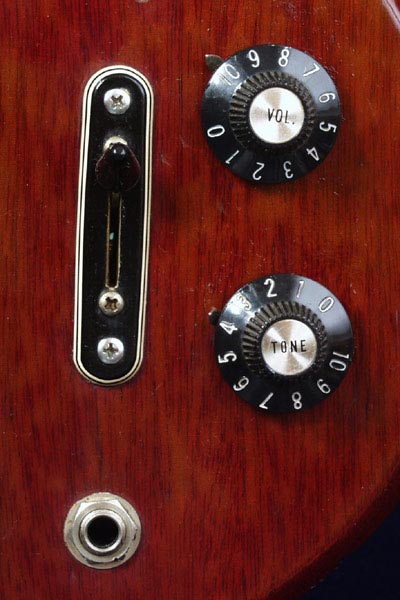 1973 Gibson EB4L. Body detail - witch hat volume and tone knobs, input jack and pickup selector switch