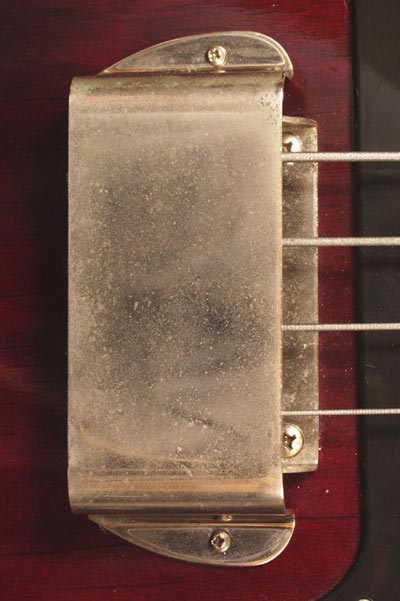 1975 Gibson Grabber bass. Body detail - bridge cover, and bridge