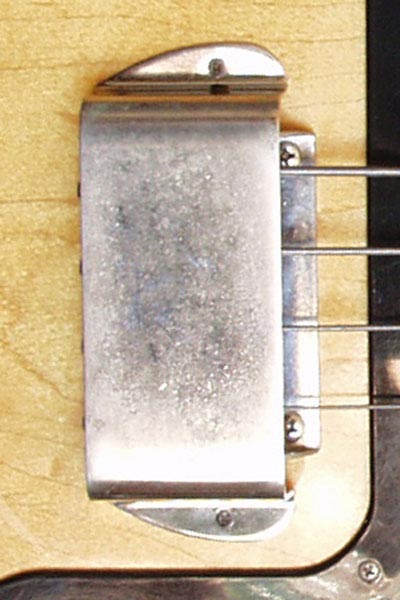 1977 Gibson Grabber bass. Body detail - bridge cover, and bridge