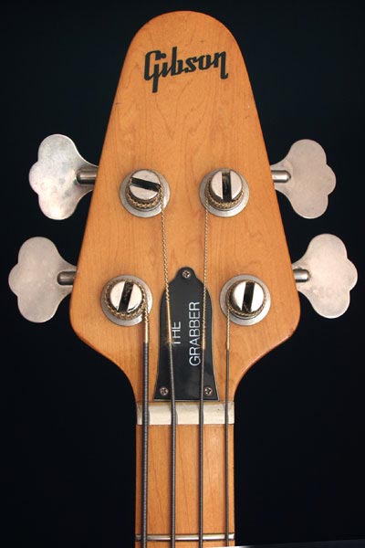 1977 Gibson Grabber bass. Body detail - headstock with Gibson logo