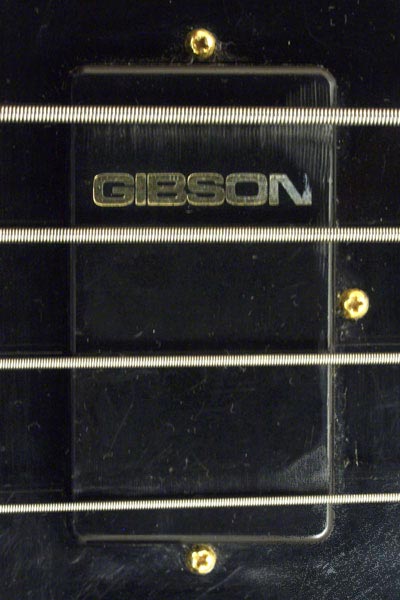 The pickups on the 20/20 are marked with the word GIBSON in gold lettering. These pickups were not used on any other Gibson bass guitar