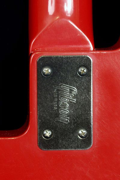 1987 Gibson 20/20 bass. Bridge detail, in this case the newly designed 3 point bridge
