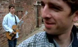 Paul McGuigan (guigsy) bass player with Oasis. Screen shot from the video shakermaker