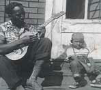 Ralphe Armstrong as a child, with his father Howard