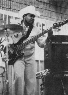 Gibson endorsing bassist Ralphe Armstrong, demonstrating the Gibson Victory bass (fretless in this case) at the Atlanta NAMM show, 1982